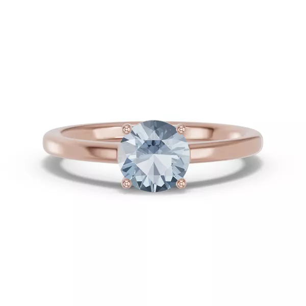 Round Aquamarine East-West Ring