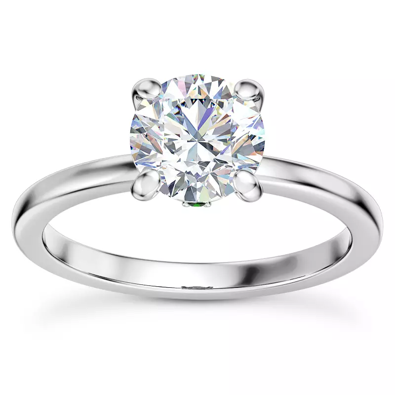 Platinum Solo Solitaire Ring With Emerald Accent