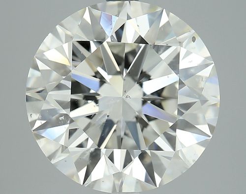 7.01ct K SI2 Rare Carat Ideal Cut Round Diamond