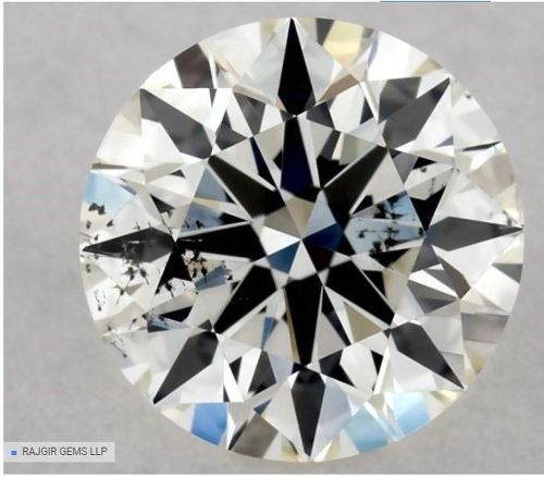 0.61ct K SI2 Rare Carat Ideal Cut Round Diamond