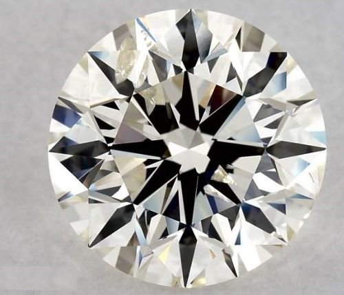 5.01ct K SI2 Rare Carat Ideal Cut Round Diamond