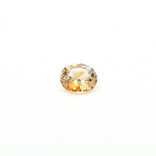 0.66 Carat Light Orange Oval Sapphire
