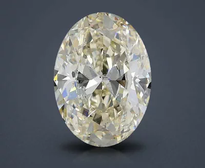3.03ct K SI1 Rare Carat Ideal Cut Oval Diamond