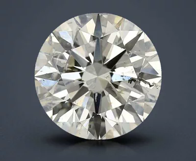 3.01ct K SI2 Rare Carat Ideal Cut Round Diamond