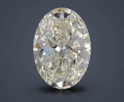 5.51ct K SI2 Rare Carat Ideal Cut Oval Diamond