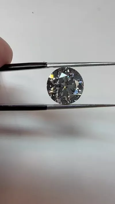 5.71ct G SI2 Rare Carat Ideal Cut Round Diamond