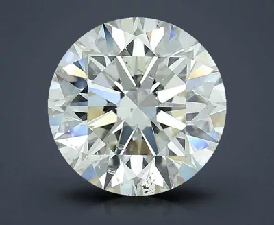 3.03ct K SI2 Rare Carat Ideal Cut Round Diamond
