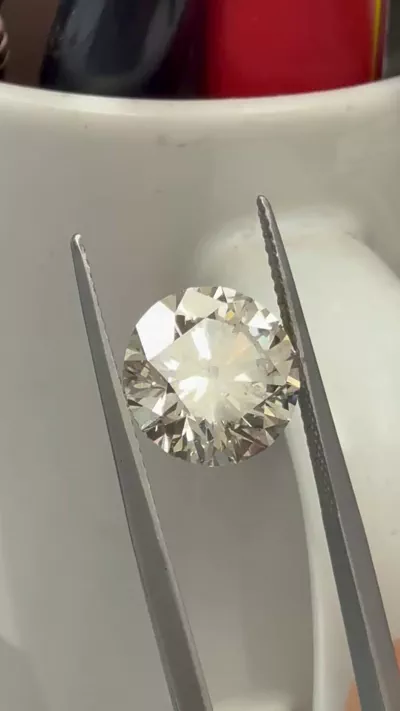 5.01ct J SI2 Rare Carat Ideal Cut Round Diamond