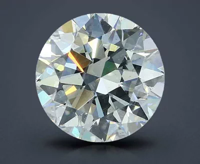 5.01ct K SI2 Rare Carat Ideal Cut Round Diamond