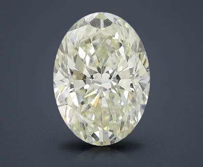 7.03ct K SI1 Rare Carat Ideal Cut Oval Diamond