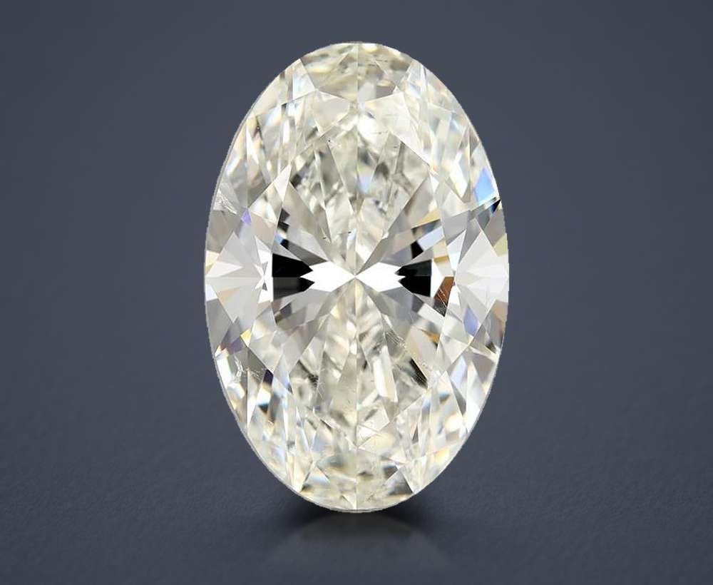 5.21ct J SI2 Rare Carat Ideal Cut Oval Diamond