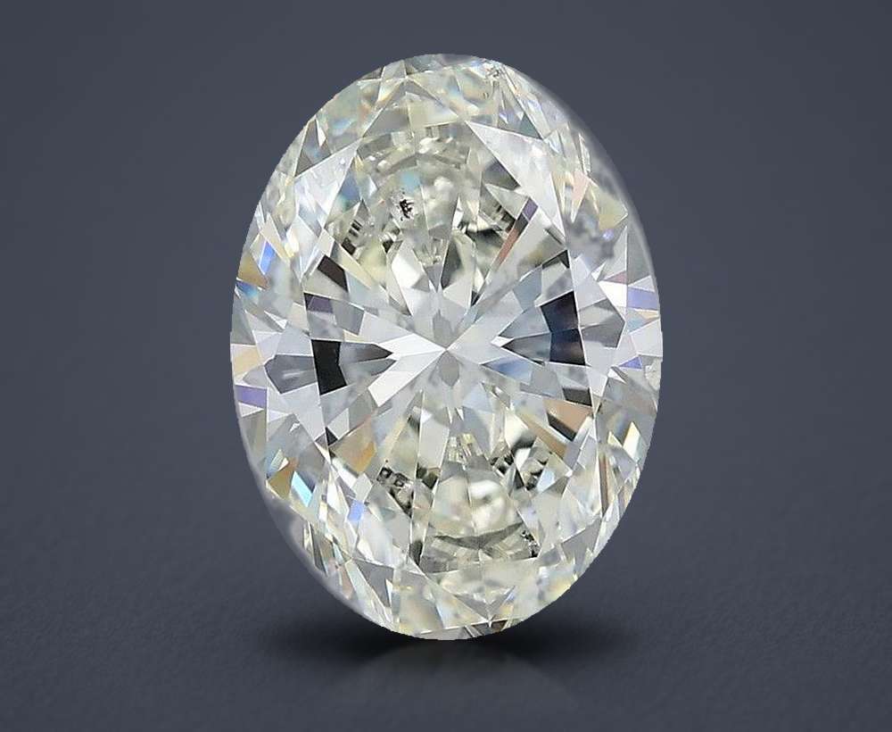3.03ct K SI2 Rare Carat Ideal Cut Oval Diamond