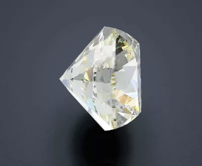 3.03ct K SI2 Rare Carat Ideal Cut Round Diamond