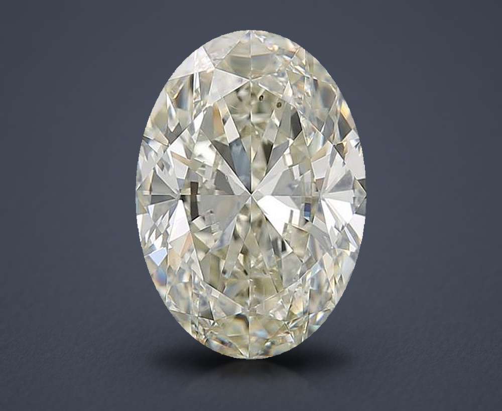 3.02ct K SI2 Rare Carat Ideal Cut Oval Diamond