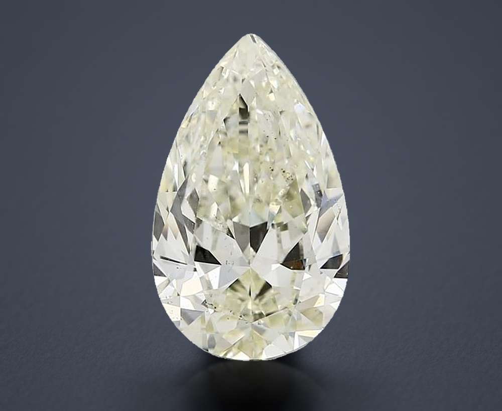 3.01ct K SI1 Rare Carat Ideal Cut Pear Diamond