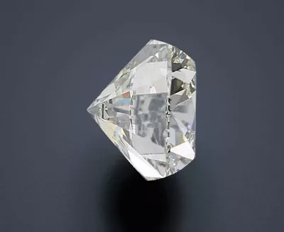 7.01ct I SI2 Rare Carat Ideal Cut Round Diamond