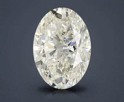 7.03ct K SI2 Rare Carat Ideal Cut Oval Diamond