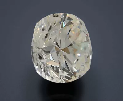 7.03ct K SI2 Rare Carat Ideal Cut Round Diamond
