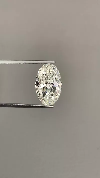 7.19ct J SI2 Rare Carat Ideal Cut Oval Diamond