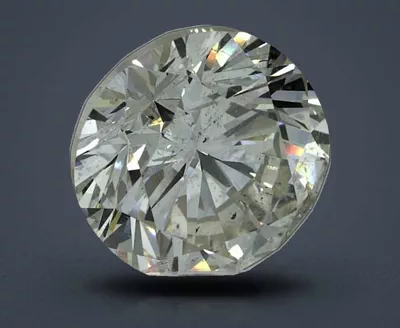 5.69ct K SI2 Rare Carat Ideal Cut Round Diamond
