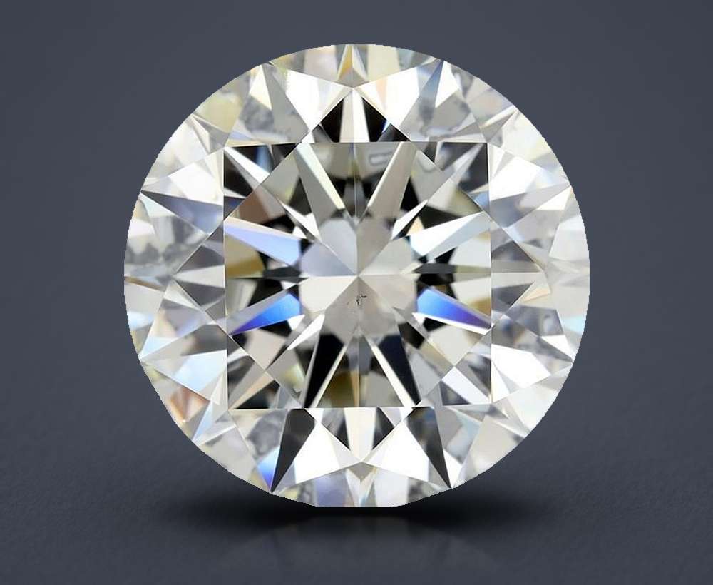 5.01ct K SI2 Rare Carat Ideal Cut Round Diamond