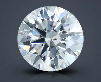 4.01ct K SI2 Rare Carat Ideal Cut Round Diamond