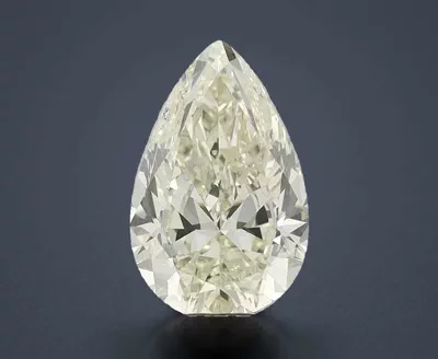 7.01ct K SI2 Rare Carat Ideal Cut Pear Diamond
