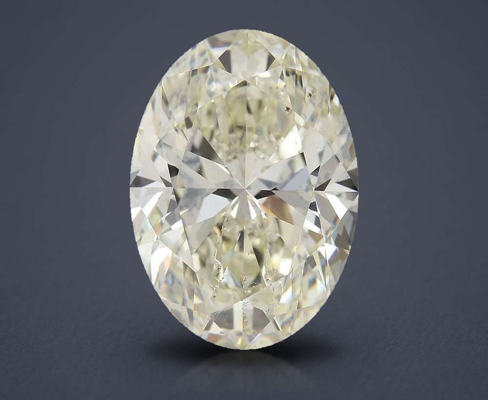 5.03ct K SI1 Rare Carat Ideal Cut Oval Diamond