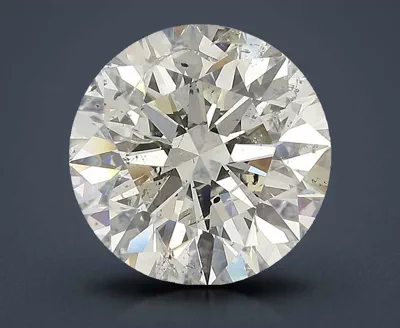 5.09ct K SI2 Rare Carat Ideal Cut Round Diamond