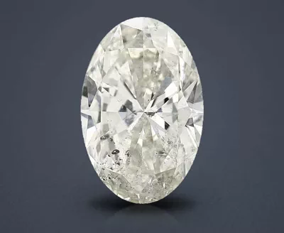 5.01ct K SI2 Rare Carat Ideal Cut Oval Diamond