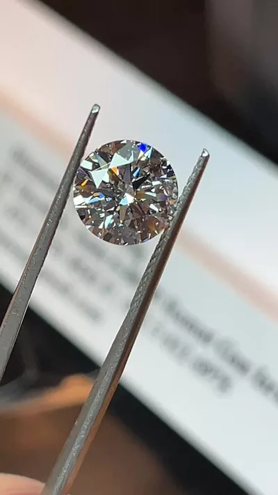 3.08ct E SI2 Rare Carat Ideal Cut Round Diamond