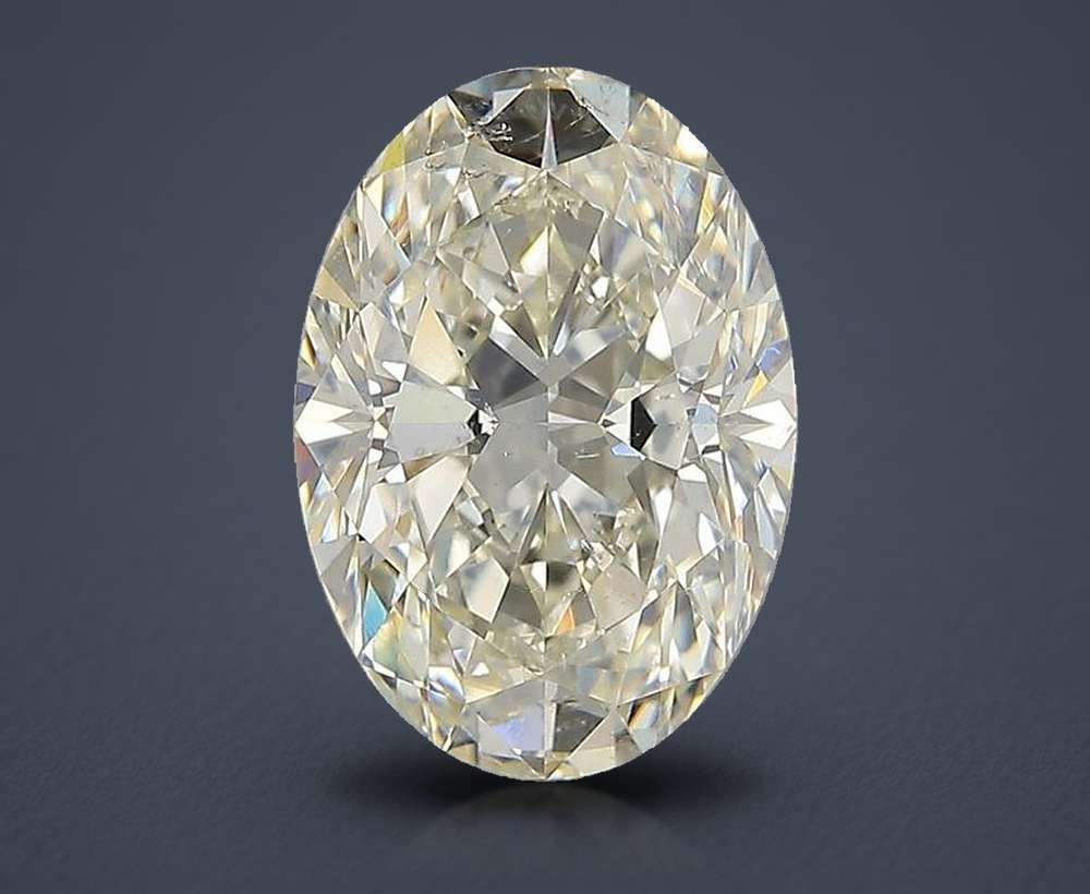 3.02ct K SI2 Rare Carat Ideal Cut Oval Diamond