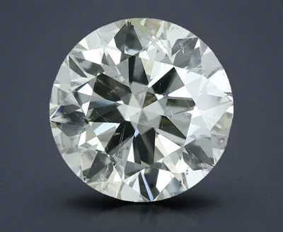 4.01ct K SI2 Rare Carat Ideal Cut Round Diamond