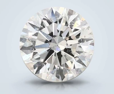 3.16ct J SI2 Rare Carat Ideal Cut Round Diamond