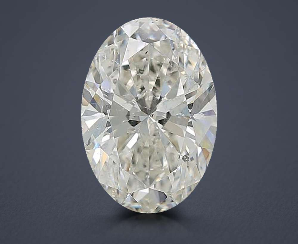 3.03ct K SI2 Rare Carat Ideal Cut Oval Diamond