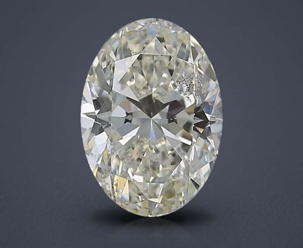 3.15ct J SI2 Rare Carat Ideal Cut Oval Diamond