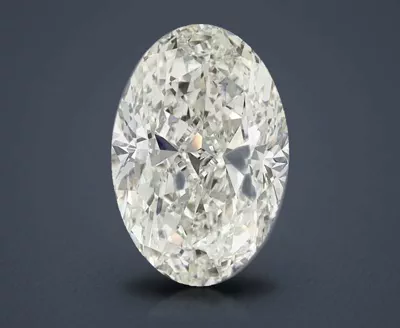 6.02ct K SI1 Rare Carat Ideal Cut Oval Diamond
