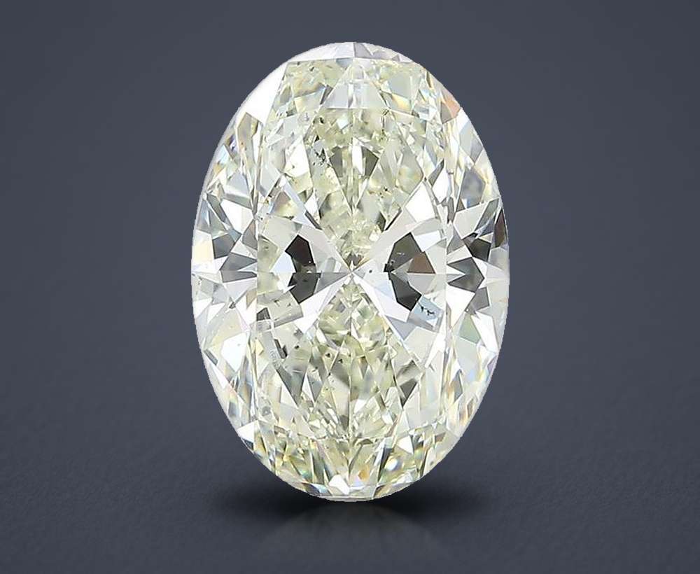 3.01ct K SI1 Rare Carat Ideal Cut Oval Diamond