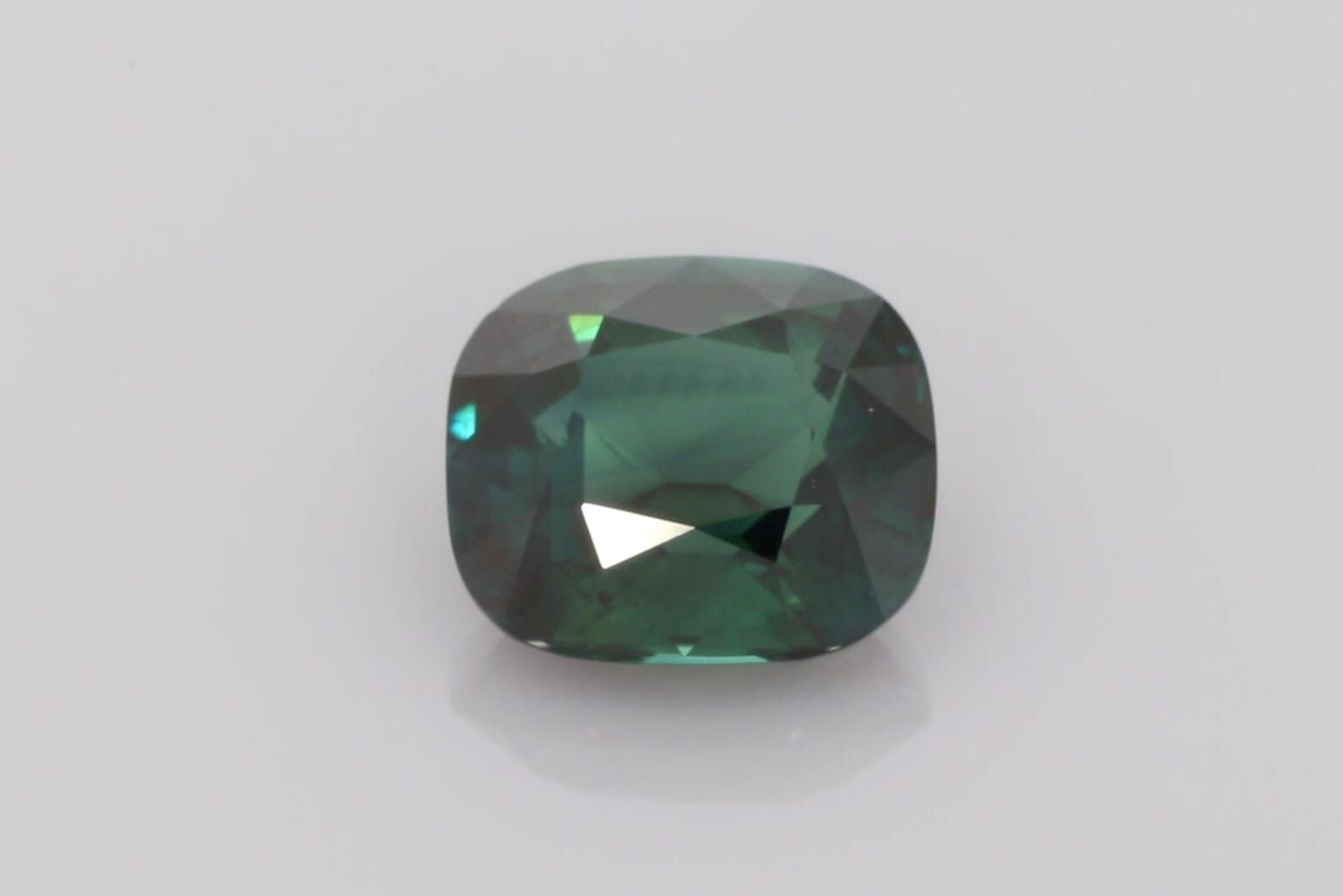9.31 Carat Teal Cushion Sapphire