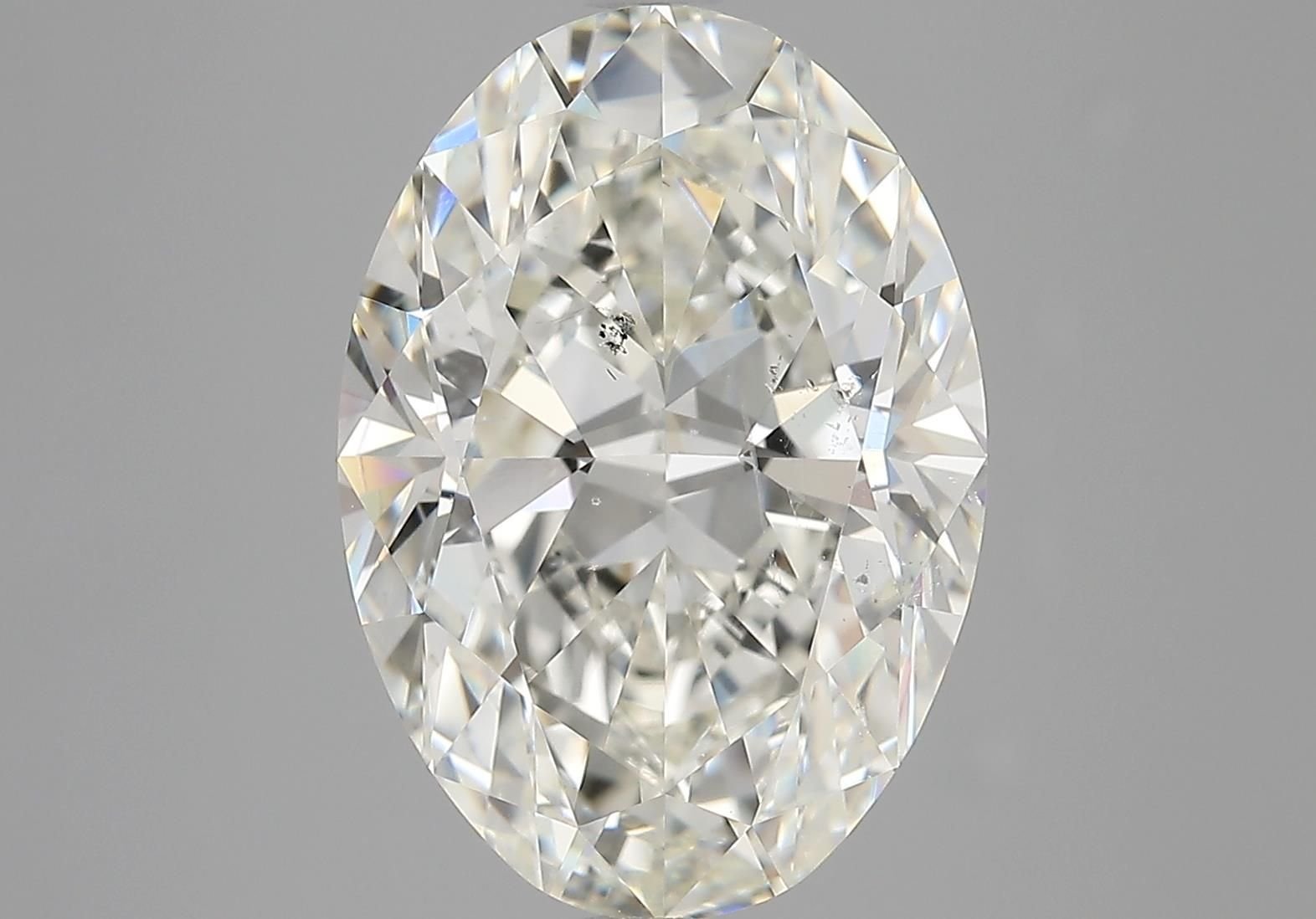 6.01ct K SI2 Rare Carat Ideal Cut Oval Diamond