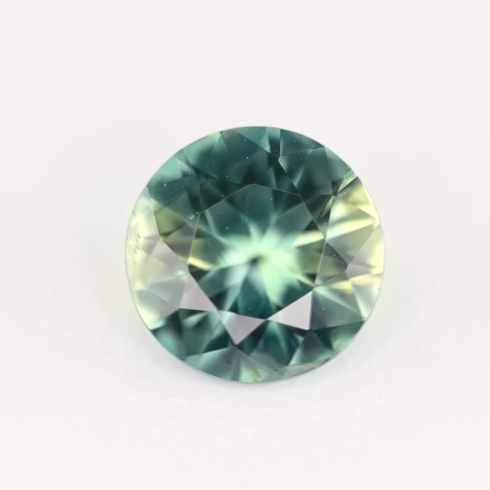 0.66 Carat Teal Round Sapphire