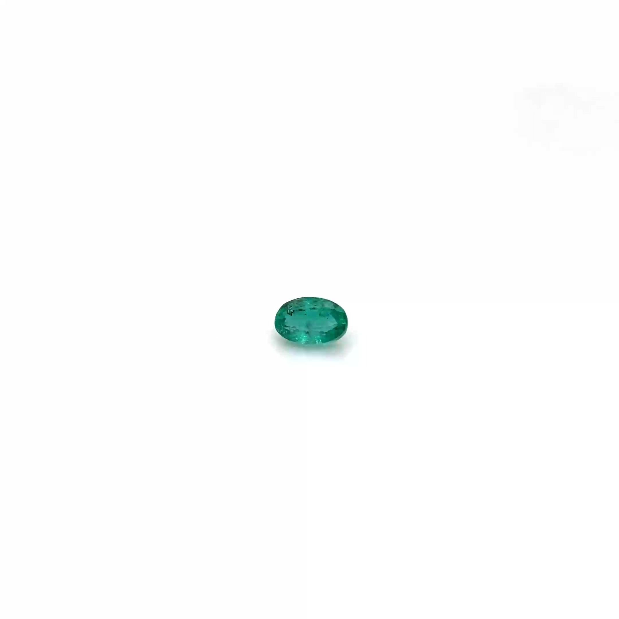 0.47 Carat Vivid Green Oval Emerald