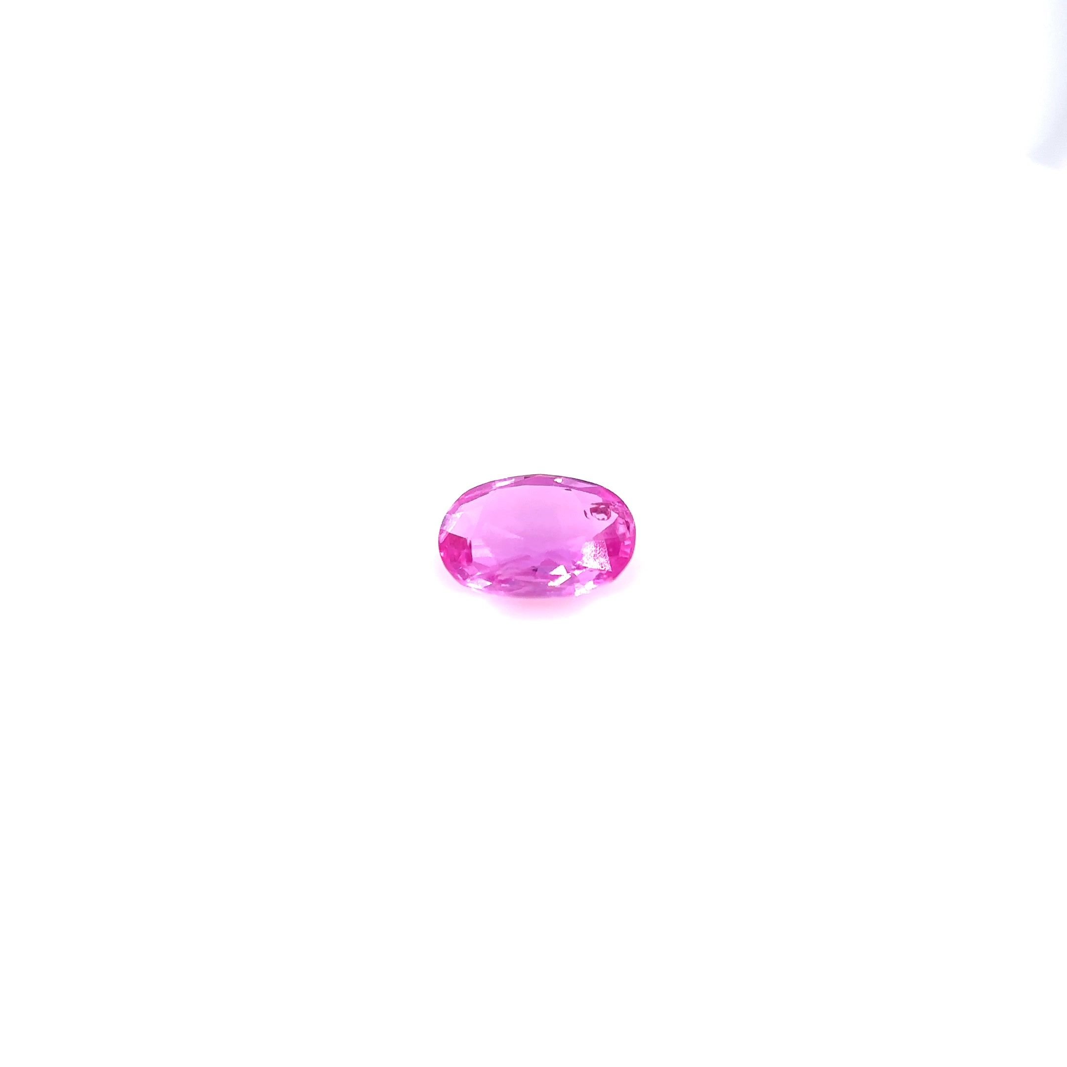 0.66 Carat Vivid Pink Oval Sapphire