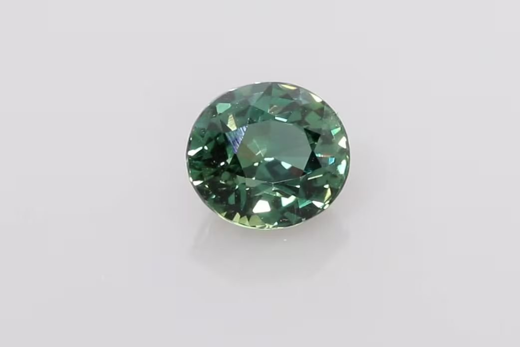 1.30 Carat Vivid Teal Oval Sapphire