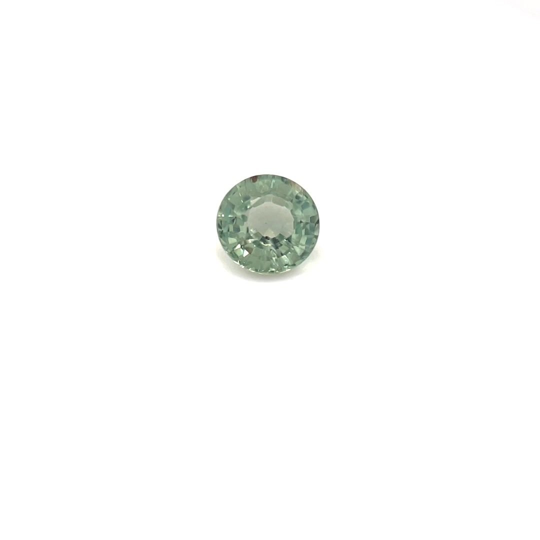 0.44 Carat Light Green Round Sapphire