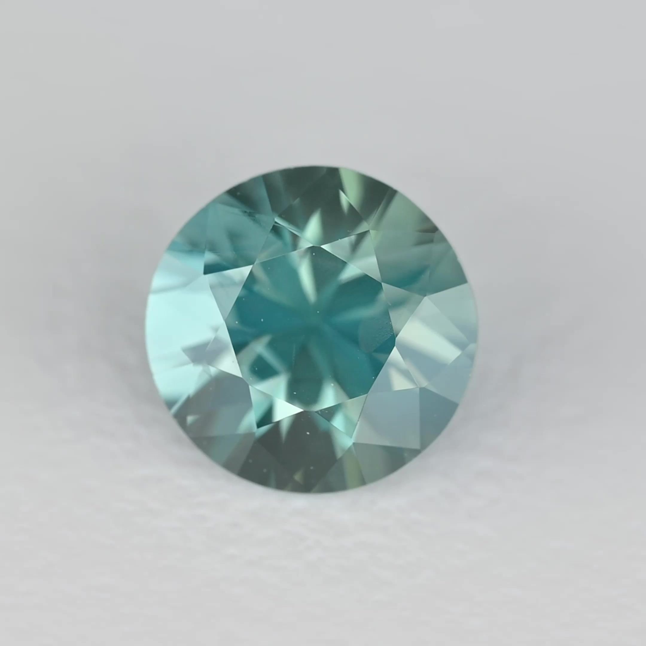 0.89 Carat Teal Round Sapphire