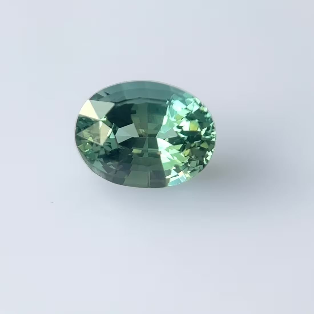 9.55 Carat Teal Oval Sapphire