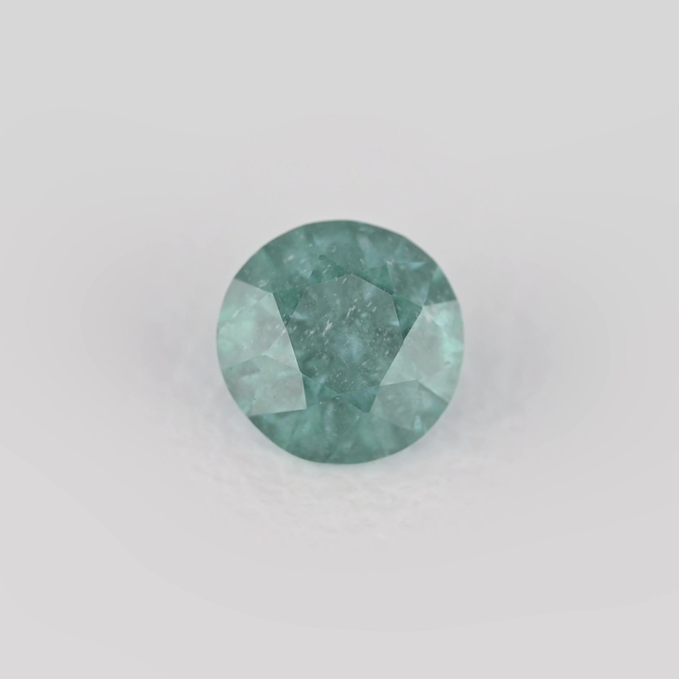 0.29 Carat Teal Round Sapphire