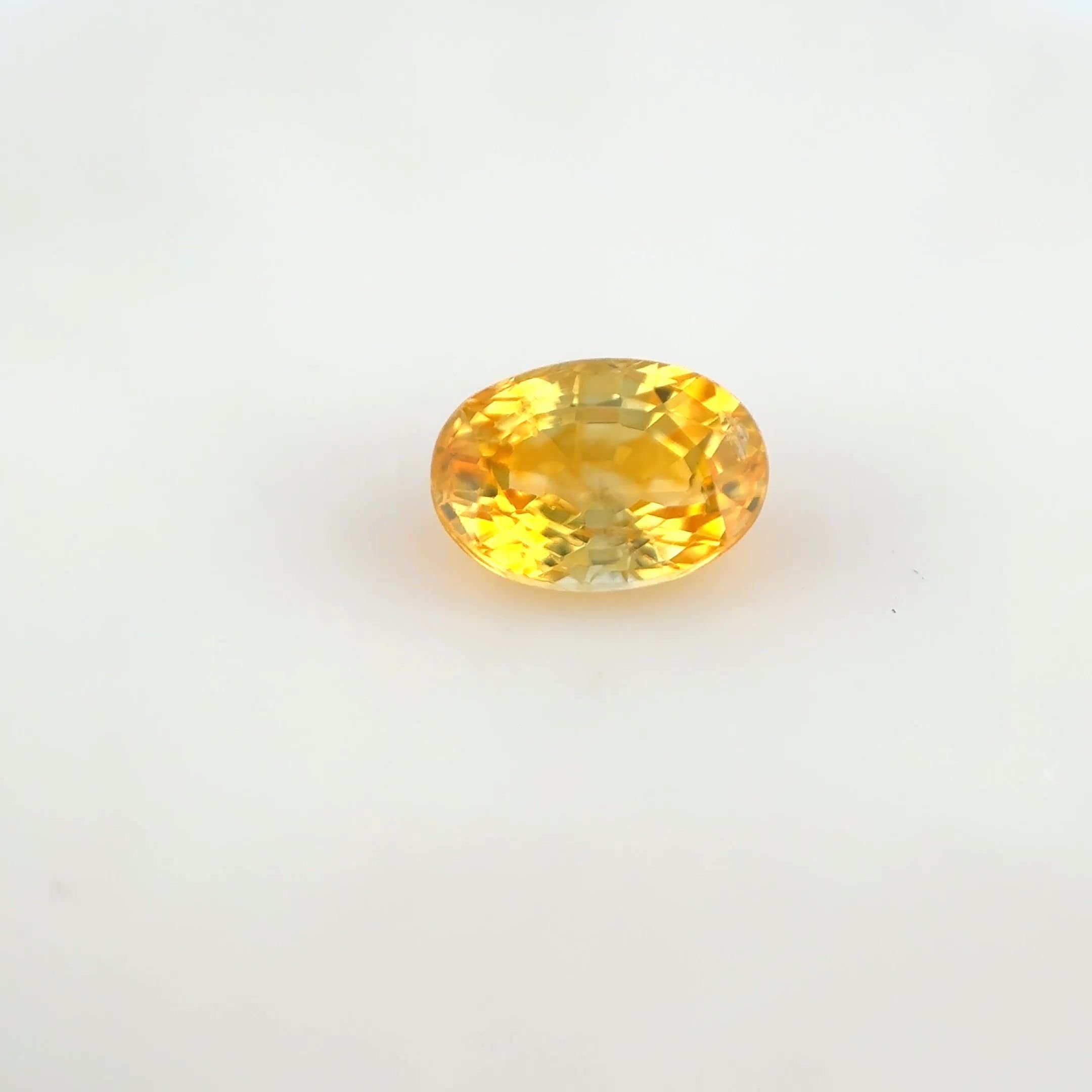 0.70 Carat Vivid Yellow Oval Sapphire