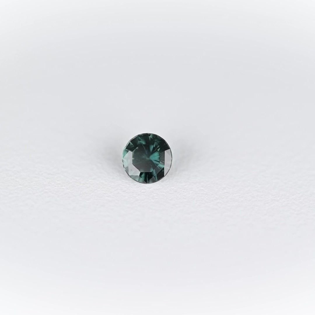 0.87 Carat Teal Round Sapphire